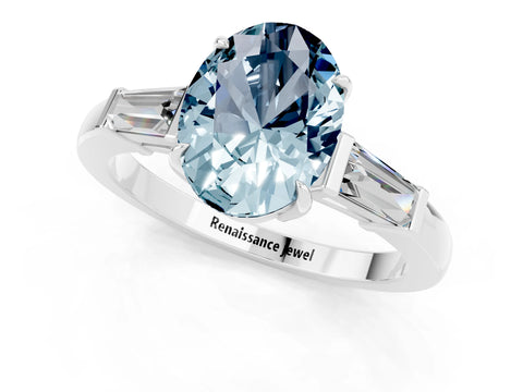 White gold Oval Cut Cut Diamond Ring with Tapered Baguette Side Stones in Four-Prong Setting_1