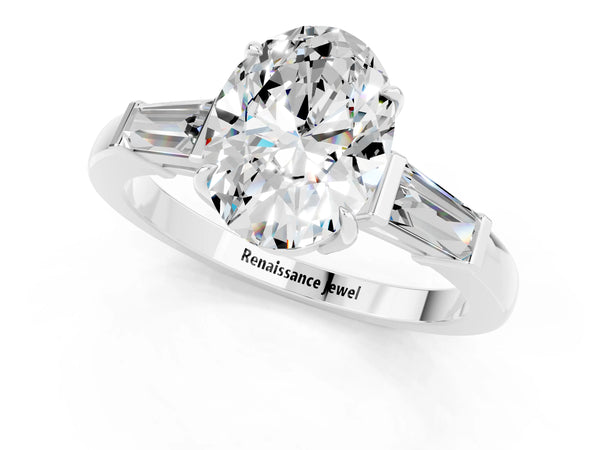 White gold Oval Cut Moissanite Three-Stone Ring with Tapered Baguette Side Stones and Prong Setting