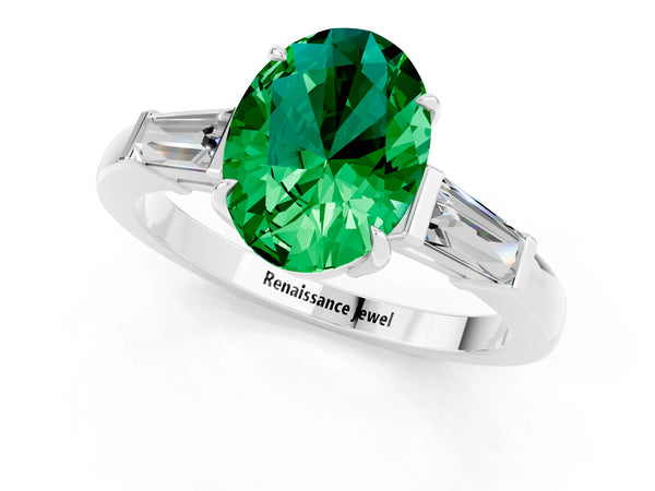 Silver Oval Cut Emerald Three-Stone Ring with Tapered Baguette Side Stones and Prong Setting