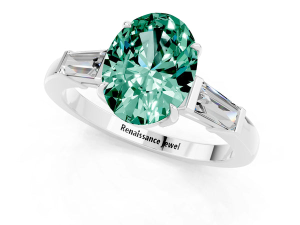White gold Oval Cut Green Sapphire Three-Stone Ring with Tapered Baguette Side Stones and Prong Setting