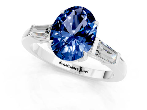 White gold Oval Cut Cut Diamond Ring with Tapered Baguette Side Stones in Four-Prong Setting_1