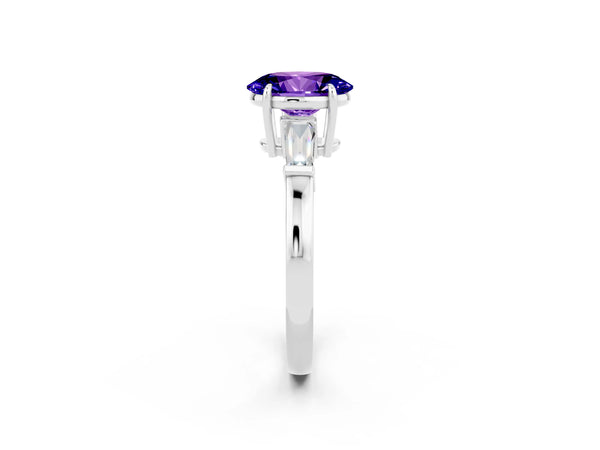 White gold Oval Cut Tanzanite Three-Stone Ring with Tapered Baguette Side Stones and Prong Setting
