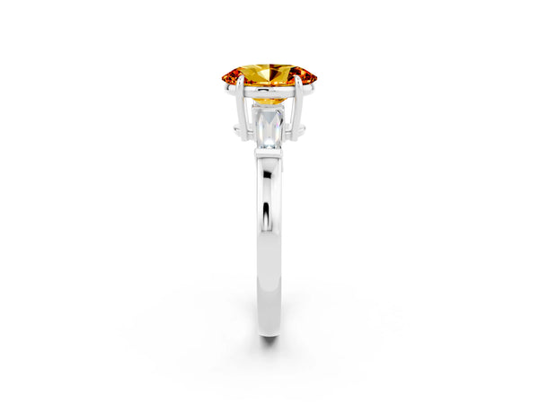 White gold Oval Cut Citrine Three-Stone Ring with Tapered Baguette Side Stones and Prong Setting