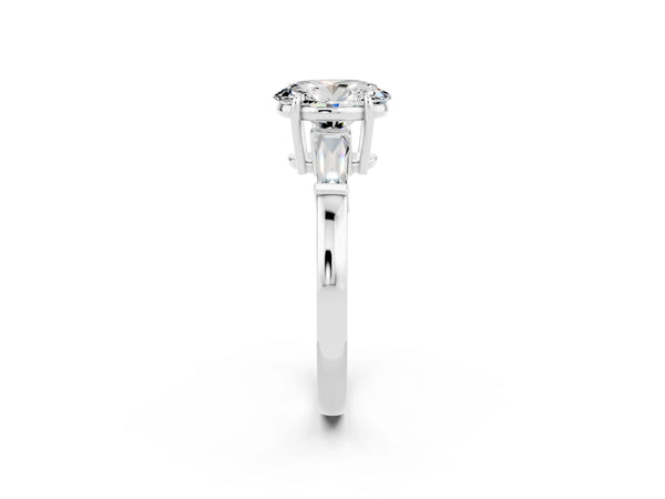 White gold Oval Cut Moissanite Three-Stone Ring with Tapered Baguette Side Stones and Prong Setting