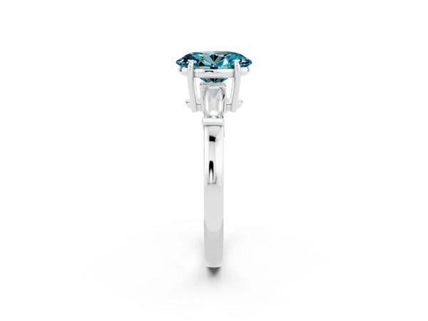 Silver Oval Cut Cut Diamond Ring with Tapered Baguette Side Stones in Four-Prong Setting
