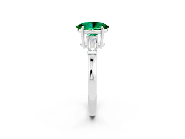 Silver Oval Cut Emerald Three-Stone Ring with Tapered Baguette Side Stones and Prong Setting