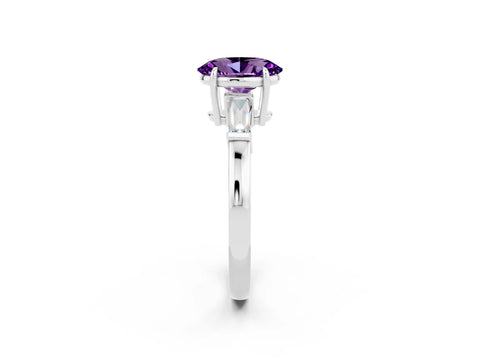 White gold Oval Cut Cut Diamond Ring with Tapered Baguette Side Stones in Four-Prong Setting_2