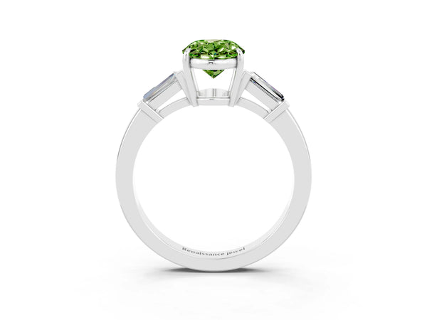 Platinum Oval Cut Cut Diamond Ring with Tapered Baguette Side Stones in Four-Prong Setting