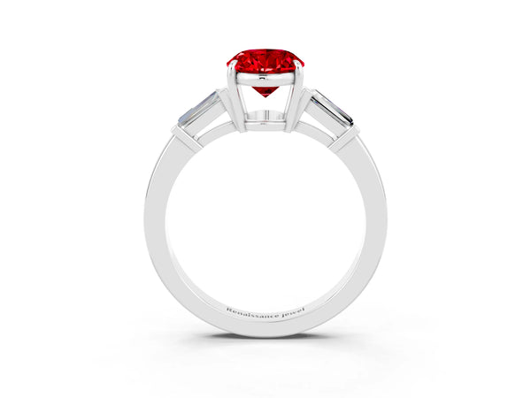 White gold Oval Cut Cut Diamond Ring with Tapered Baguette Side Stones in Four-Prong Setting