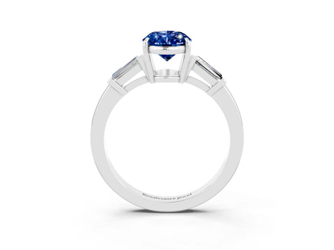 White gold Oval Cut Cut Diamond Ring with Tapered Baguette Side Stones in Four-Prong Setting_3