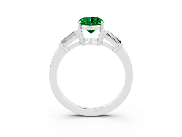 Silver Oval Cut Emerald Three-Stone Ring with Tapered Baguette Side Stones and Prong Setting