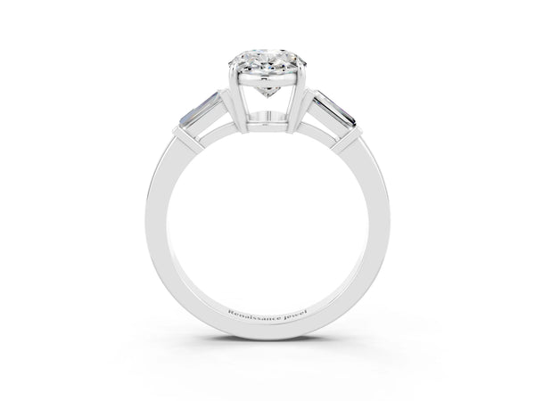 White gold Oval Cut Moissanite Three-Stone Ring with Tapered Baguette Side Stones and Prong Setting