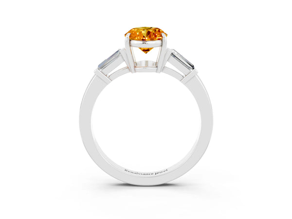 Platinum Oval Cut Citrine Three-Stone Ring with Tapered Baguette Side Stones and Prong Setting