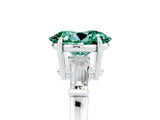 White gold Oval Cut Cut Diamond Ring with Tapered Baguette Side Stones in Four-Prong Setting_5