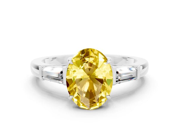 White gold Oval Cut Yellow Sapphire Three-Stone Ring with Tapered Baguette Side Stones and Prong Setting