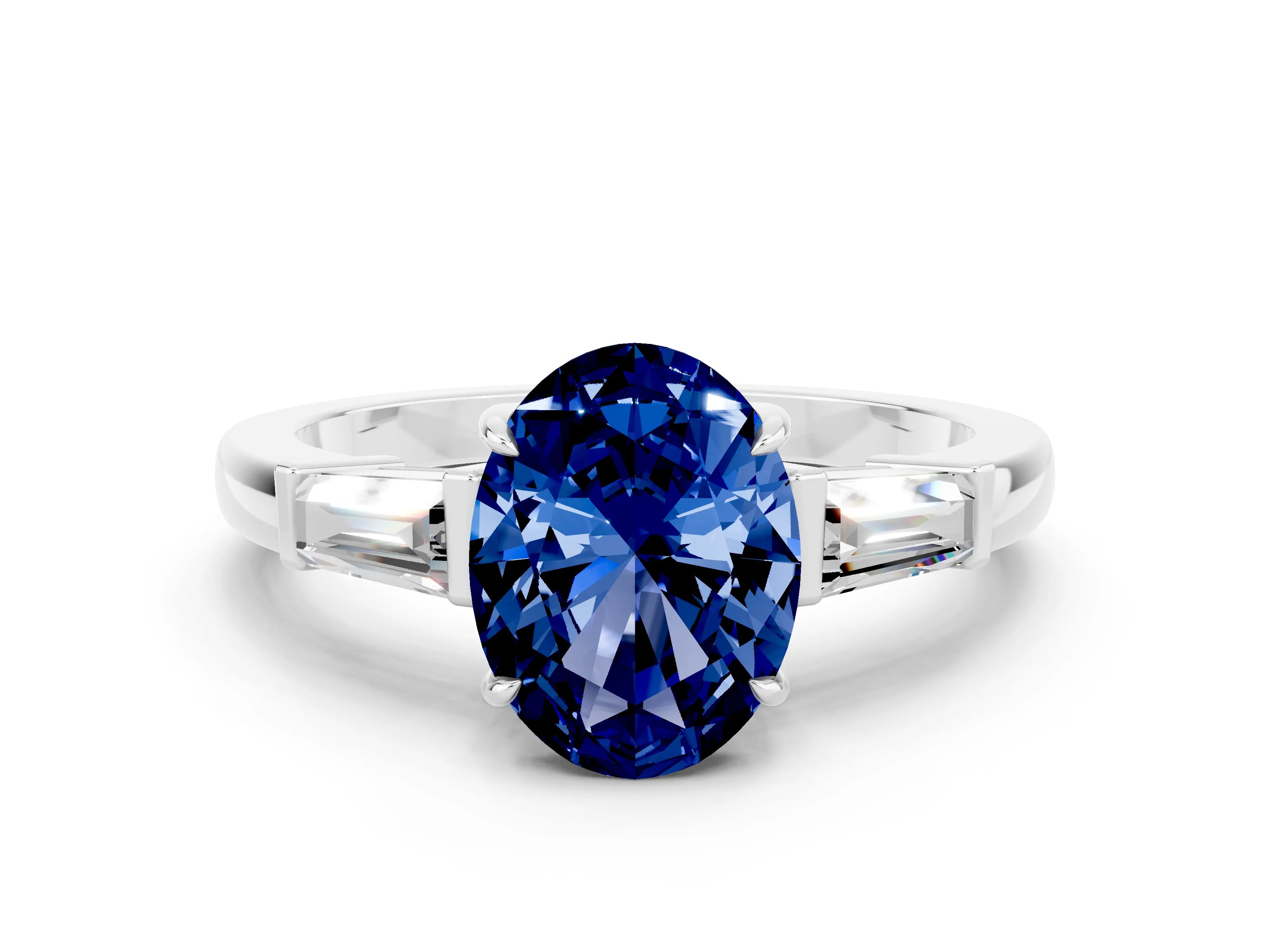 White gold Oval Cut Cut Diamond Ring with Tapered Baguette Side Stones in Four-Prong Setting