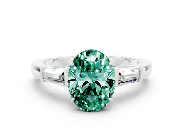Silver Oval Cut Green Sapphire Three-Stone Ring with Tapered Baguette Side Stones and Prong Setting