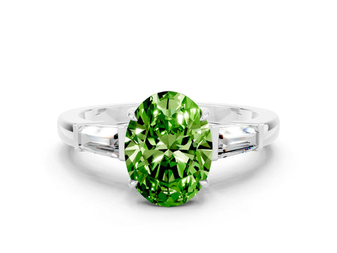 White gold Oval Cut Cut Diamond Ring with Tapered Baguette Side Stones in Four-Prong Setting