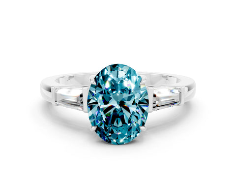 White gold Oval Cut Cut Diamond Ring with Tapered Baguette Side Stones in Four-Prong Setting