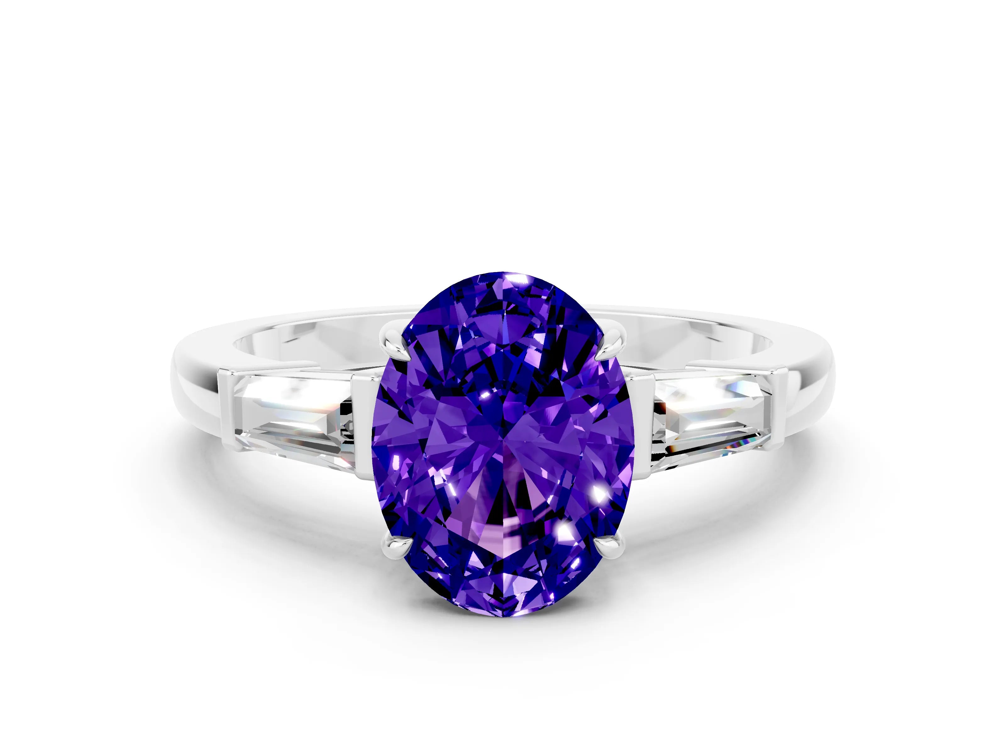 White gold Oval Cut Cut Diamond Ring with Tapered Baguette Side Stones in Four-Prong Setting
