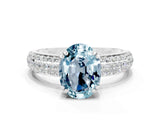 White gold Oval Cut Cut Pave Diamond Engagement Ring with Channel Set Band and Four-Prong Setting