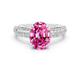 White gold Oval Cut Cut Pave Diamond Engagement Ring with Channel Set Band and Four-Prong Setting