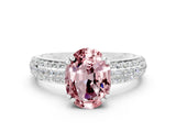 White gold Oval Cut Cut Pave Diamond Engagement Ring with Channel Set Band and Four-Prong Setting