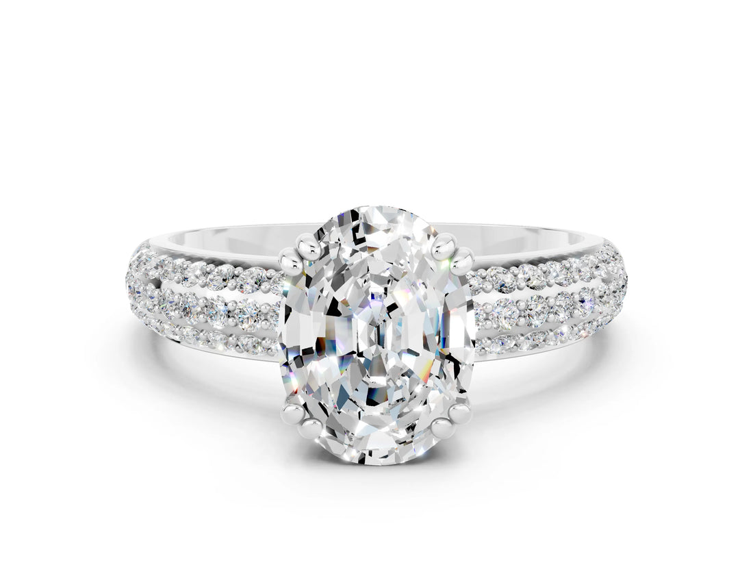White gold Oval Cut Cut Pave Diamond Engagement Ring with Channel Set Band and Four-Prong Setting