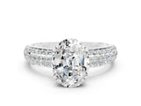 White gold Oval Cut Cut Pave Diamond Engagement Ring with Channel Set Band and Four-Prong Setting