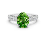 White gold Oval Cut Cut Pave Diamond Engagement Ring with Channel Set Band and Four-Prong Setting