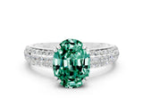 White gold Oval Cut Cut Pave Diamond Engagement Ring with Channel Set Band and Four-Prong Setting