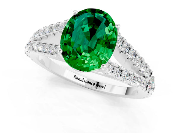 Platinum Oval Cut Emerald Split Shank Engagement Ring with Round Pavé and Prong Setting