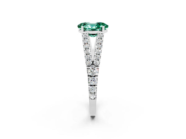 Platinum Oval Cut Green Sapphire Split Shank Engagement Ring with Round Pavé and Prong Setting