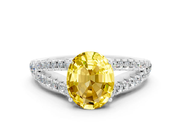 White gold Oval Cut Yellow Sapphire Split Shank Engagement Ring with Round Pavé and Prong Setting