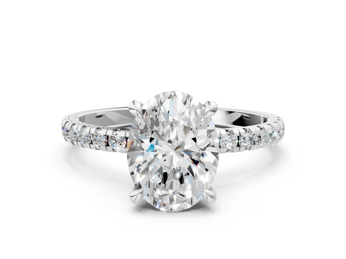 White gold Oval Cut Diamond Brilliant Solitaire Ring with Pavé Band and Four-Prong Setting_177