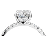 White gold Oval Cut Diamond Brilliant Solitaire Ring with Pavé Band and Four-Prong Setting_181