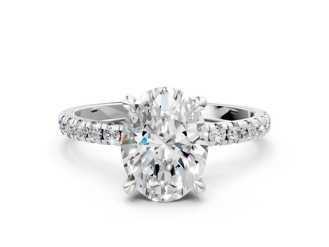 White gold Oval Cut Diamond Brilliant Solitaire Ring with Pavé Band and Four-Prong Setting_49