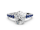 White gold Oval Cut Diamond Cathedral Solitaire Ring with Round with Blue Sapphire side stone Pavé Band_12