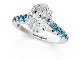 White gold Oval Cut Diamond Cathedral Solitaire Ring with Round with Blue Topaz side stone Pavé Band_1