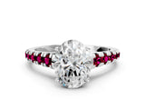 White gold Oval Cut Diamond Cathedral Solitaire Ring with Round with Garnet side stone Pavé Band