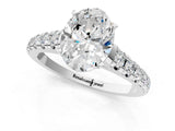 White gold Oval Cut Diamond Cathedral Solitaire Ring with Round with Moissanite side stone Pavé Band_25