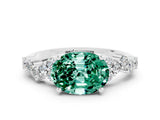 White gold Oval Cut Diamond Cluster Pavé Band with Four-Prong Setting