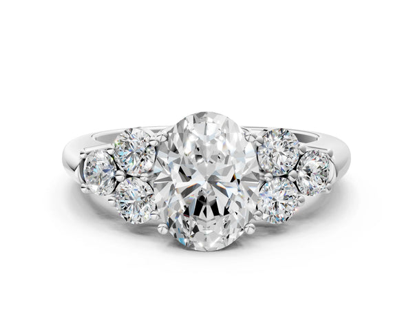 White gold Oval Cut Diamond Cluster Ring with Round Accent Stones and Prong Setting on a Classic Band