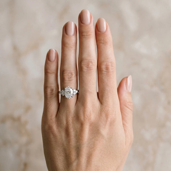 Platinum Princess Cut Cut Diamond Cluster Ring with Solitaire Band and Four-Prong Setting