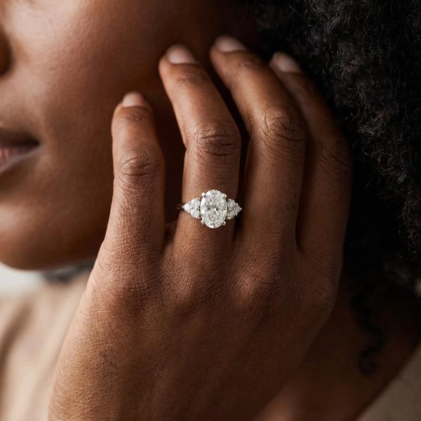 Platinum Princess Cut Cut Diamond Cluster Ring with Solitaire Band and Four-Prong Setting