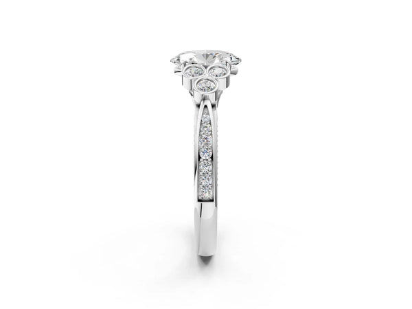 White gold Oval Cut Diamond Engagement Ring with Bezel Set Round Side Stones and Prong Setting