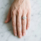 White gold Oval Cut Diamond Engagement Ring with Pavé Band and Four-Prong Setting_61