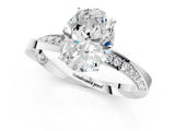 White gold Oval Cut Diamond Engagement Ring with Side Stone Accents and Four-Prong Setting_38