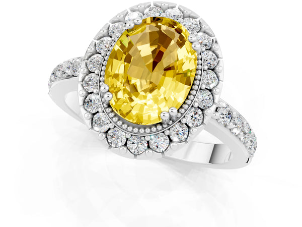 Silver Oval Cut Yellow Sapphire Halo Ring with Pavé Band and Prong Setting