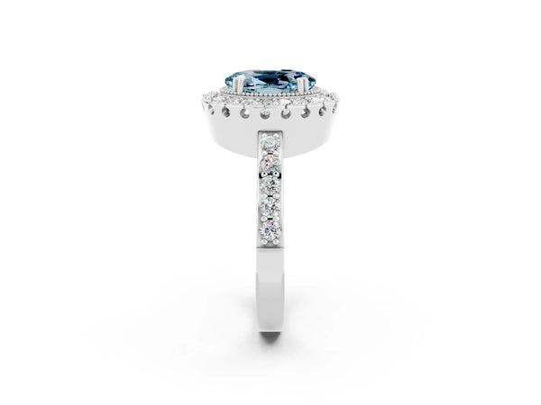 Platinum Oval Cut Aquamarine Halo Ring with Pavé Band and Prong Setting